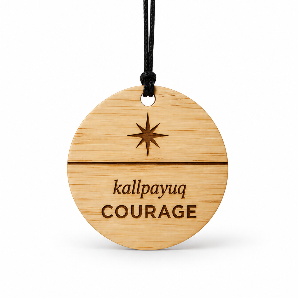 A round bamboo hanging ornament with a black cord, featuring a star engraving and the words 'kallpayuq COURAGE' on a white background.